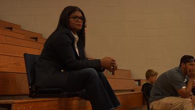 Bridgett watching her husband coach the Men's Basketball team at CSU-Bakersfield