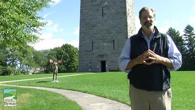 Your host, Greg Cutler, stands in front of the Bennington Battle Monument